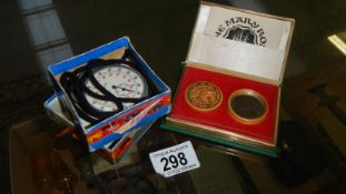 A boxed Smiths stop watch and a boxed Mary Rose compass