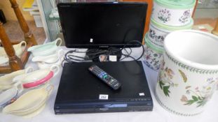 A Samsung monitor and a Panasonic HDD and DVD player