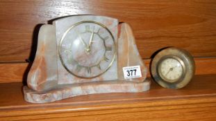 A marble clock and 1 other