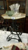 A marble topped cast iron bottom table