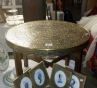 A brass topped Middle Eastern table
