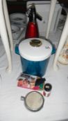 A soda syphon, pack of Sparklets, ice bucket etc.