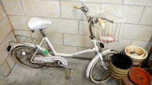 A ladies white Challenge bike