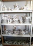 A large quantity of Noritake Progression china & cutlery (4 shelves)