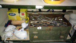 A large metal box of spanners & other DIY decorating tools