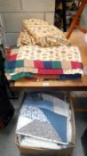 A set of matching curtains and quilts etc