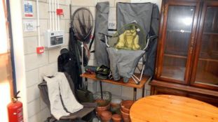 A quantity of fishing equipment nets, stools etc.