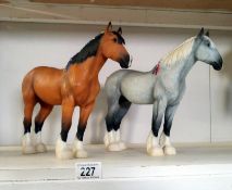 A pair of horse figures