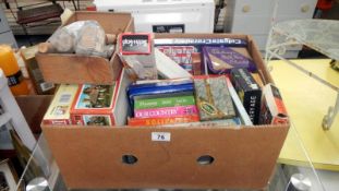 A box of old games and puzzles