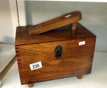 A shoe shine box & contents