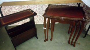 A nest of three tables with matching magazine rack