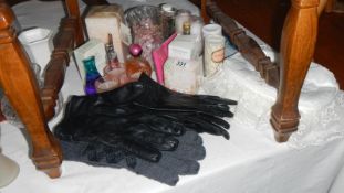 A quantity of perfume candles, gloves etc.