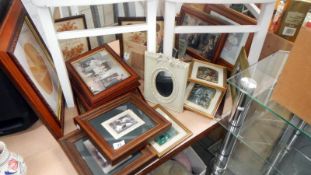 A large quantity of pictures and frames