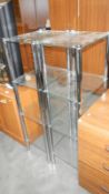 2 sets of 4 tier glass and chrome shelves