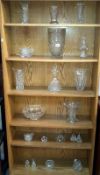 A quantity of cut glass items including vases & salt & pepper pots etc.