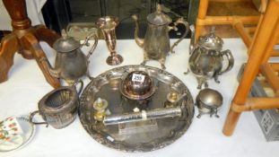 A quantity of silverplate including teapots, coffee pots etc.