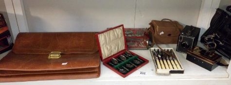 A quantity of miscellaneous items including briefcase & boxed Brownie camera etc.