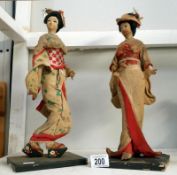 A pair of oriental figures