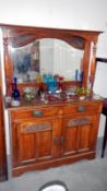 A late Victorian mirror backed sideboard