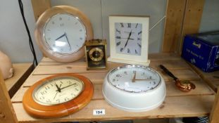 A quantity of clocks including carriage clock