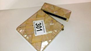 A mother of pearl card case