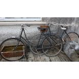 Two vintage lady's bicycles, 1 with a basket