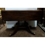 Regency Mahogany Pembroke Table, with a drawer on one end and a faux drawer on the other and folding