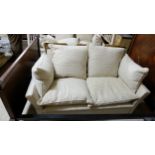 Modern 2-seater Settee with feather cushioned seats and backs, covered with cream and brown linen