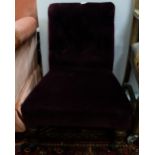 Victorian Easy Chair, the padded and buttoned back and seat covered in claret velvet, on turned