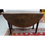 Georgian Mahogany Gate-leg Table, with oval shaped drop sides, on turned legs, pad feet, 42”w x 45”w