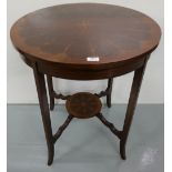 Edwardian Mahogany Occasional Table, the circular top inlaid with satinwood tassels, on tapered