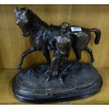 Bronze Study of a triumphant Jockey leading his Horse, “Vainqueur III”, on an oval black marble