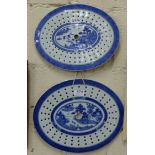 Two 19thC Blue and White Straining Fish Plates, oval shaped, with Chinese garden designs, 1x13”w,