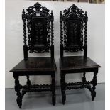 Matching Pair of 19thC Jacobean Hall Chairs, two carved birds over a floral panel and the seat