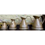 Set of Four 19thC Graduating Copper Measuring Jugs