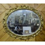 Late 19thC Florentine Framed Wall Mirror, with oval bevelled insert, shell carvings, 33”w x 26”h