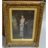 19thC Oil on Canvas, Portrait of a Lady wearing a navy velvet cloak and a white dress, in a