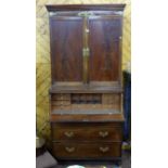 Georgian Mahogany Secretaire Bookcase, the two upper flame mahogany panelled doors over a sliding