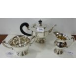 3 piece Irish Silver Teaset including Teapot with ebony handle and lid finial, a Sugar Bowl and