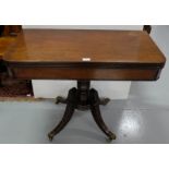 Regency Mahogany Fold-over Tea Table, with rimmed borders over a turned pod base and 4 splayed legs,