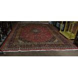 Large Red Ground Persian Kashan Carpet, traditional floral medallion design, 390cm x 293cm