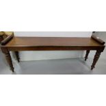 WMIV Mahogany Window Seat, the long rectangular top with scrolled ends, on 4 turned and reeded legs,