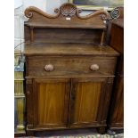 Regency Rosewood Secretaire Chiffonier, the shaped top rail decorated in relief with a large