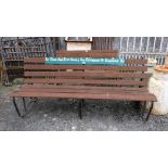 Garden Bench with wooden slats, on metal frame, 80”l, with painted wood plaque “Sit Down and Rest …”