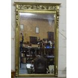 Mid 20th Gilt Wood Overmantle Wall Mirror, with rectangular beveled glass insert, the moulded top