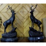 Pair of Bronze Stag Figures, poised to hunt, on a naturalistic setting, after J. Moigniro (stamped),