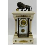 19thC White Marble and brass mounted Mantle Clock, the top mounted with bronze figure of roaring