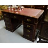 Edw. Kneehole Mahogany Writing Desk with red leatherette top, over 3 central drawers and drawers