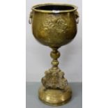 Brass Jardinière on stand with lion mask handles and crested reliefs, 13” dia x 31”h