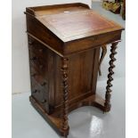 19thC Rosewood Davenport, the sloped and tooled red leather covered writing desk opening to an